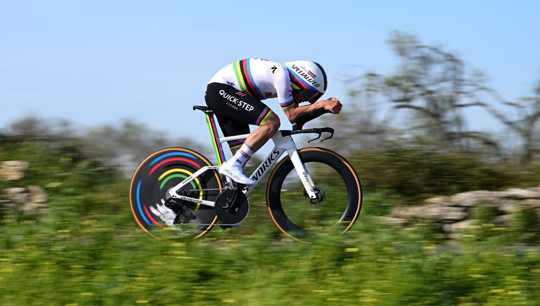 Evenepoel moves into yellow after dominant ITT win
