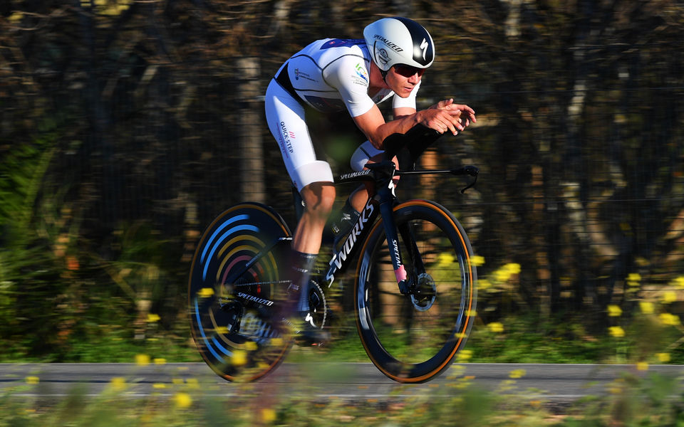 Evenepoel time trials to yellow