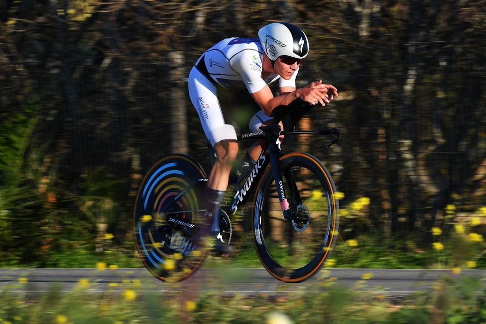 Evenepoel time trials to yellow