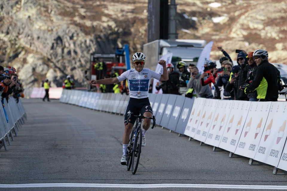 Evenepoel flies to queen stage victory